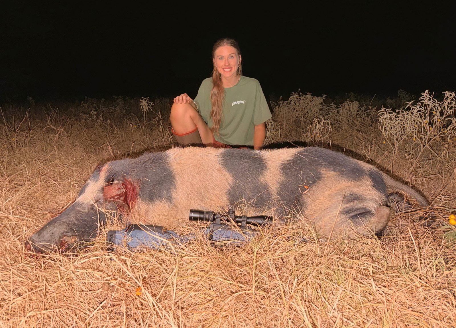 Hunter with a big Palo Pinto County hog taken on a night hunt